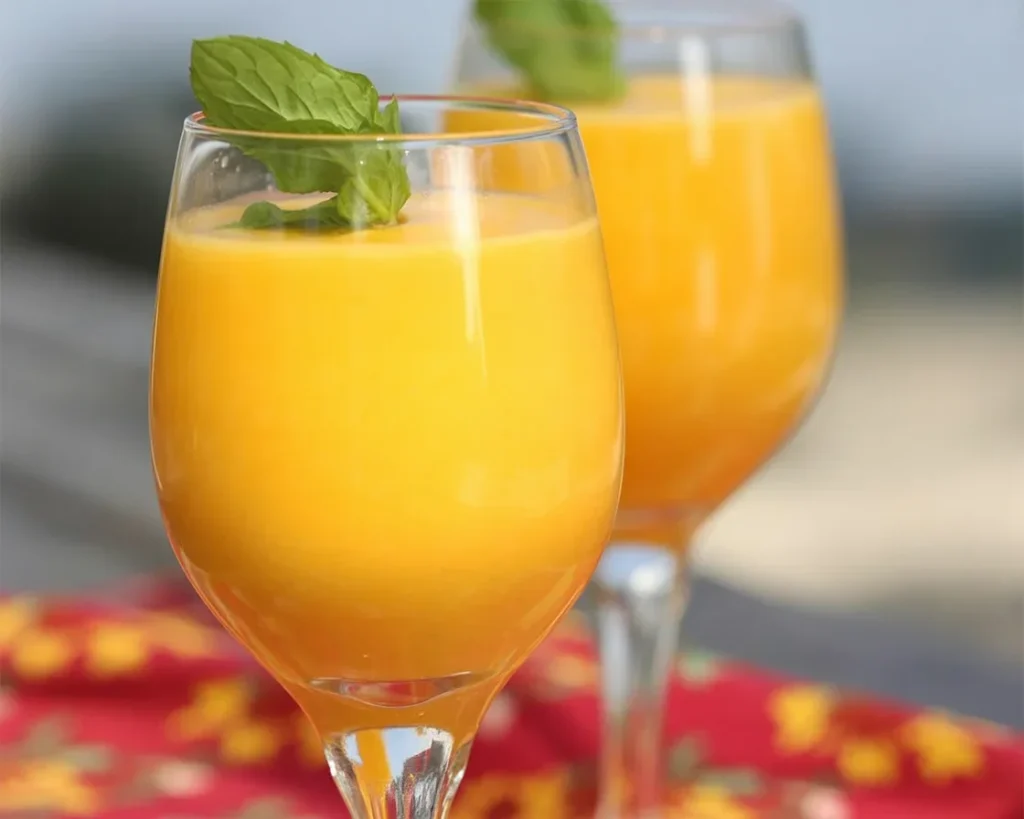 Refreshing Watermelon-Mango Smoothie with fresh ingredients and ice cubes