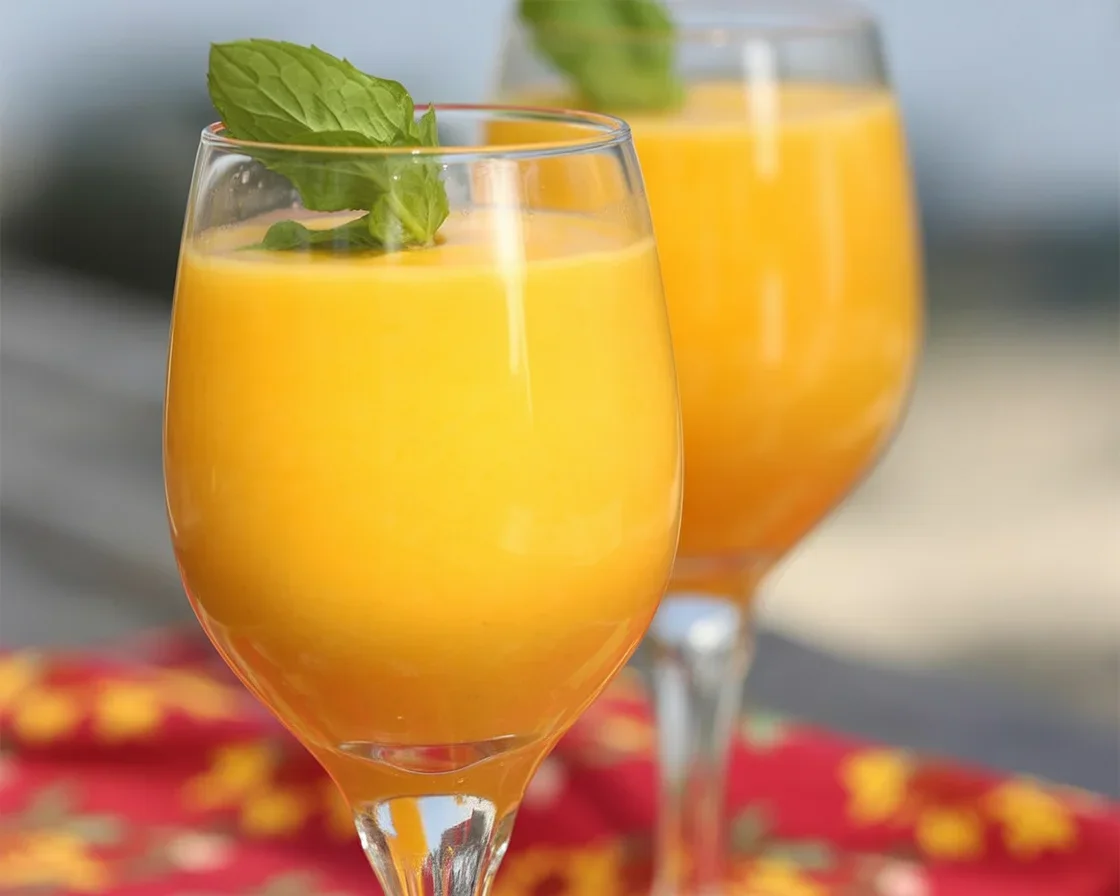 Refreshing Watermelon-Mango Smoothie with fresh ingredients and ice cubes