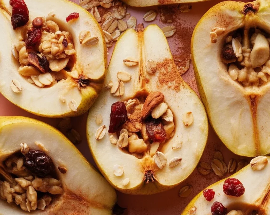 Delicious baked pears with cinnamon, maple syrup, and Greek yogurt topped with granola.