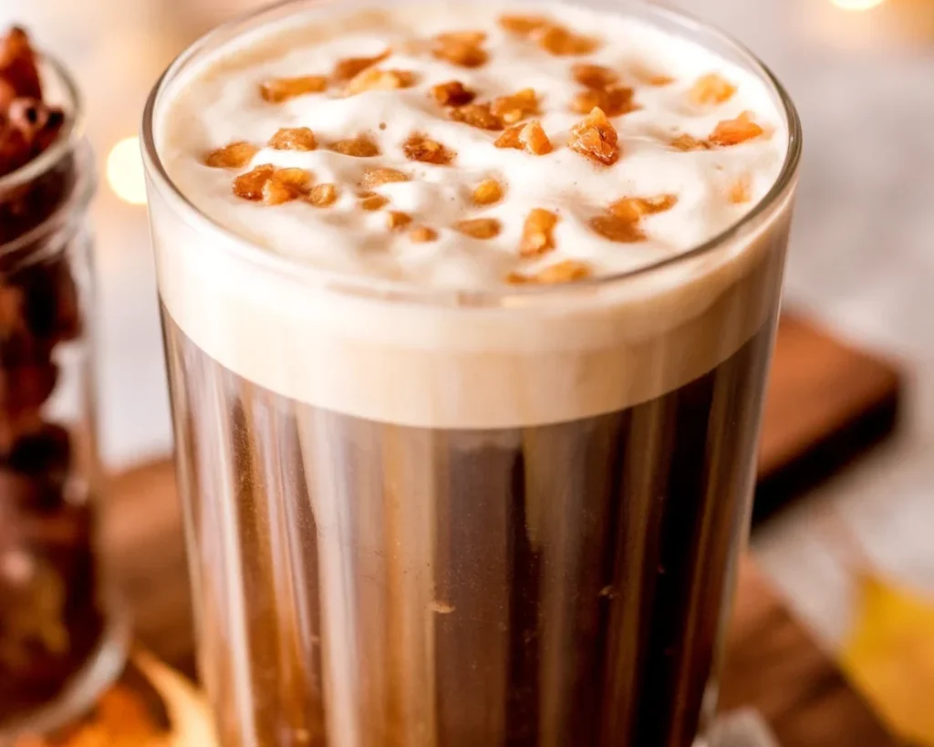 A delicious homemade Salted Pecan Crunch Cold Brew topped with pecan cold foam and crunchy toppings.