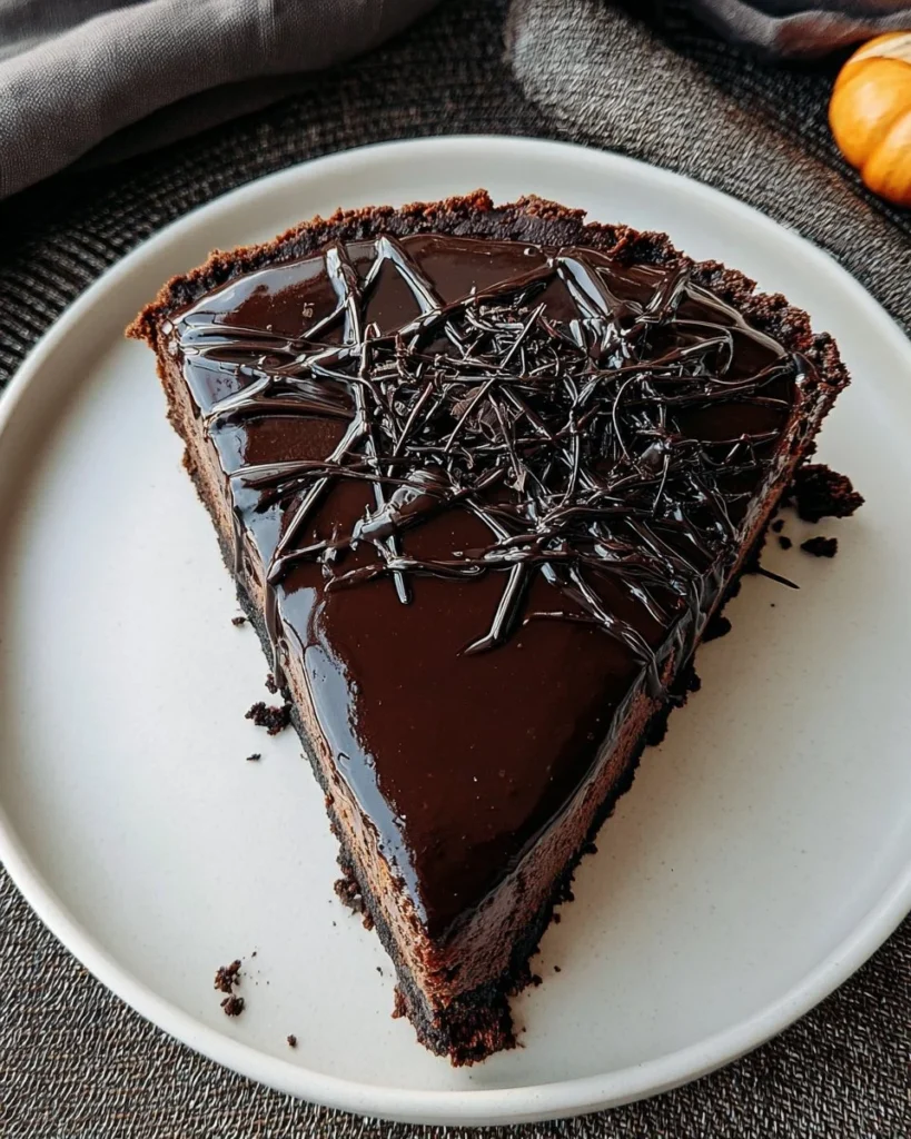Delicious black magic cheesecake topped with chocolate ganache and decorations