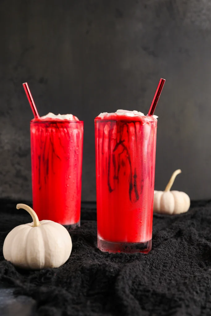 Delicious Bloody Halloween Milkshakes with spooky decorations