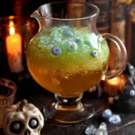 A vibrant Bubbly Witches Brew Halloween drink with colorful ingredients.