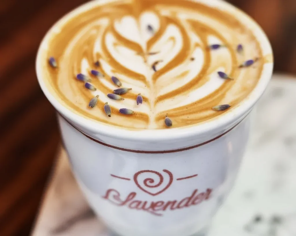 Lavender Horchata Latte made with lavender syrup and oat milk, refreshing summer drink.
