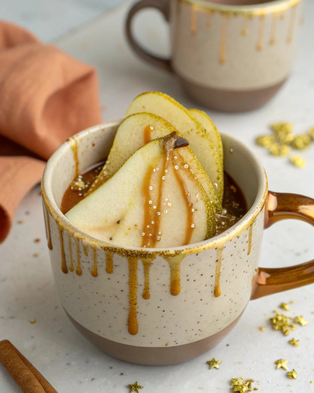 Delicious Caramel Pear Latte served in a festive cup