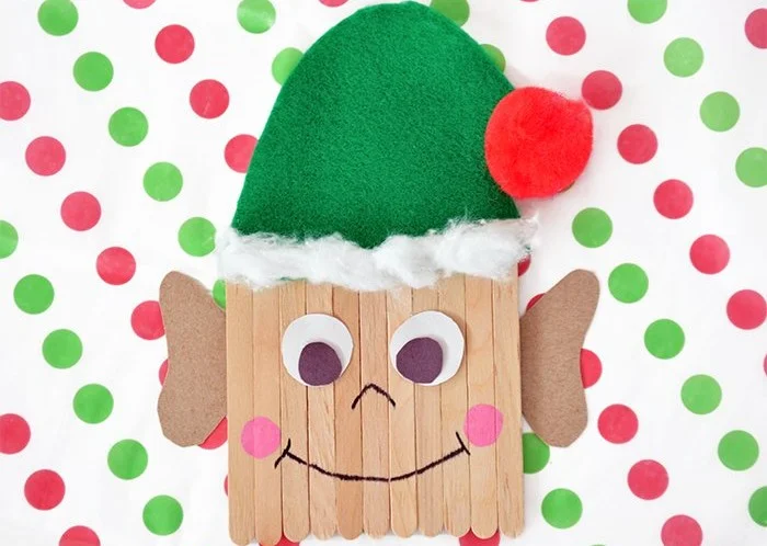 DIY Elf Craft project using popsicle sticks for Christmas decorations.