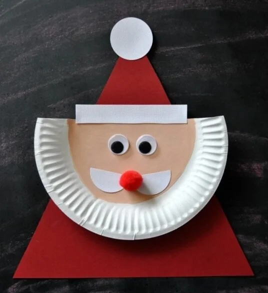DIY Paper Plate Santa Claus craft project for kids during the holiday season.