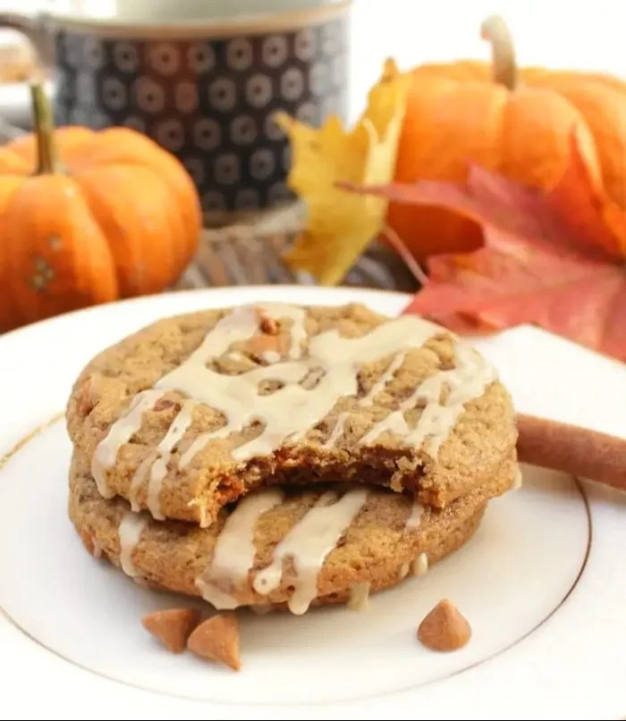 A creamy Spiced Pumpkin Latte topped with whipped cream and cinnamon.