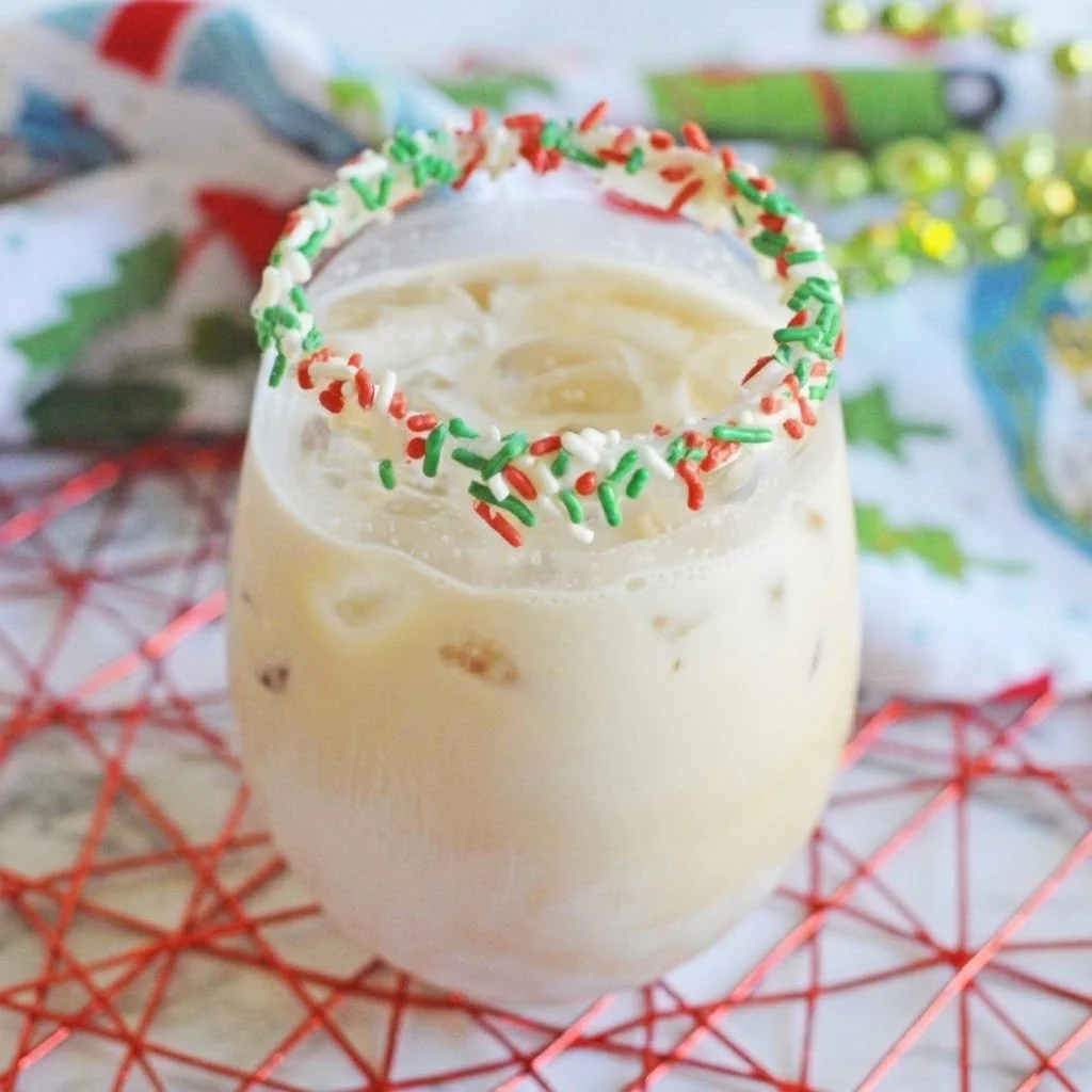 Delicious Christmas Cookie Cocktail garnished with festive decorations.
