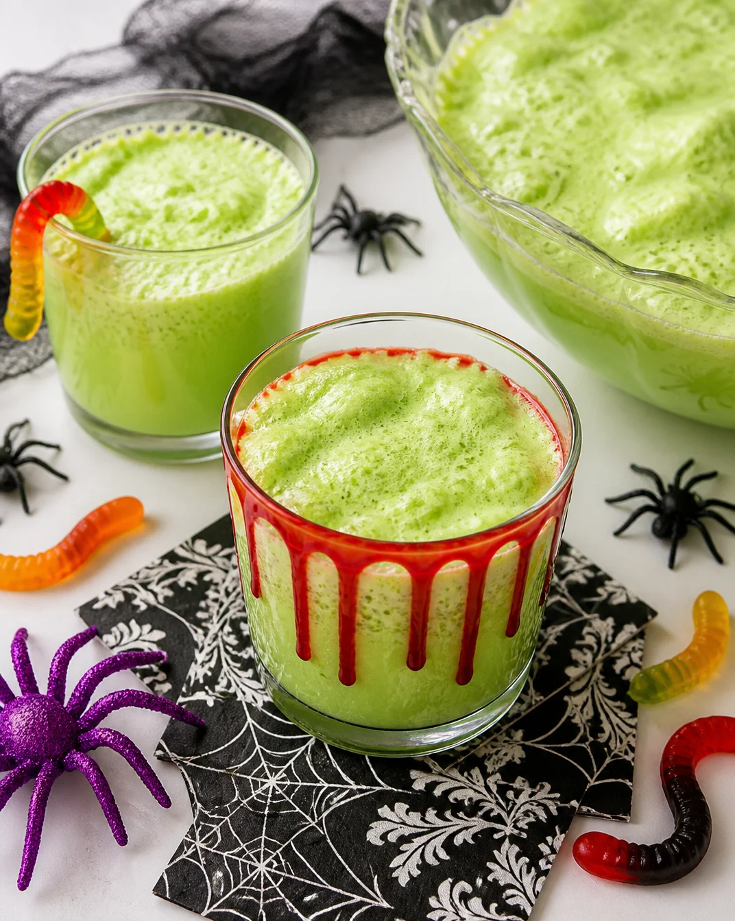 Colorful Halloween Sherbet Punch in a festive punch bowl