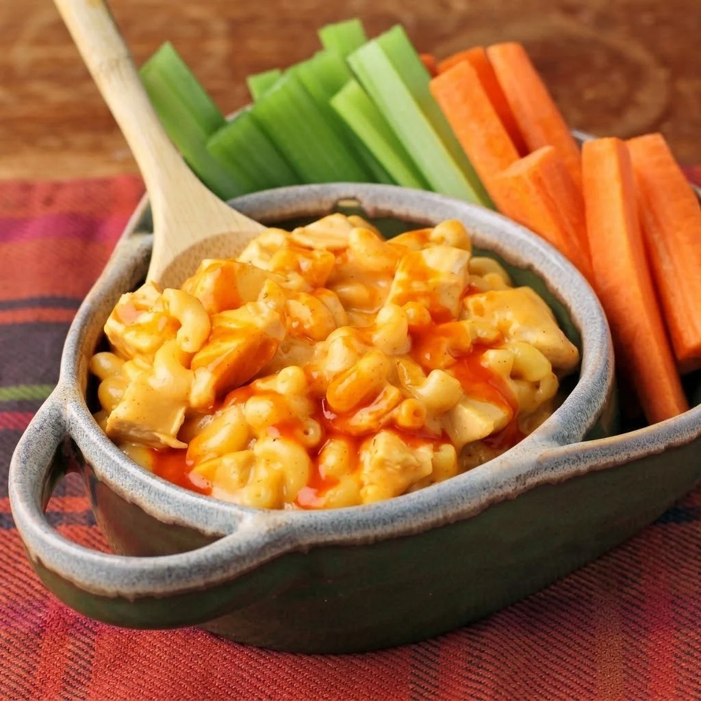 Delicious One-Pot Buffalo Chicken Mac and Cheese with creamy cheese and spices