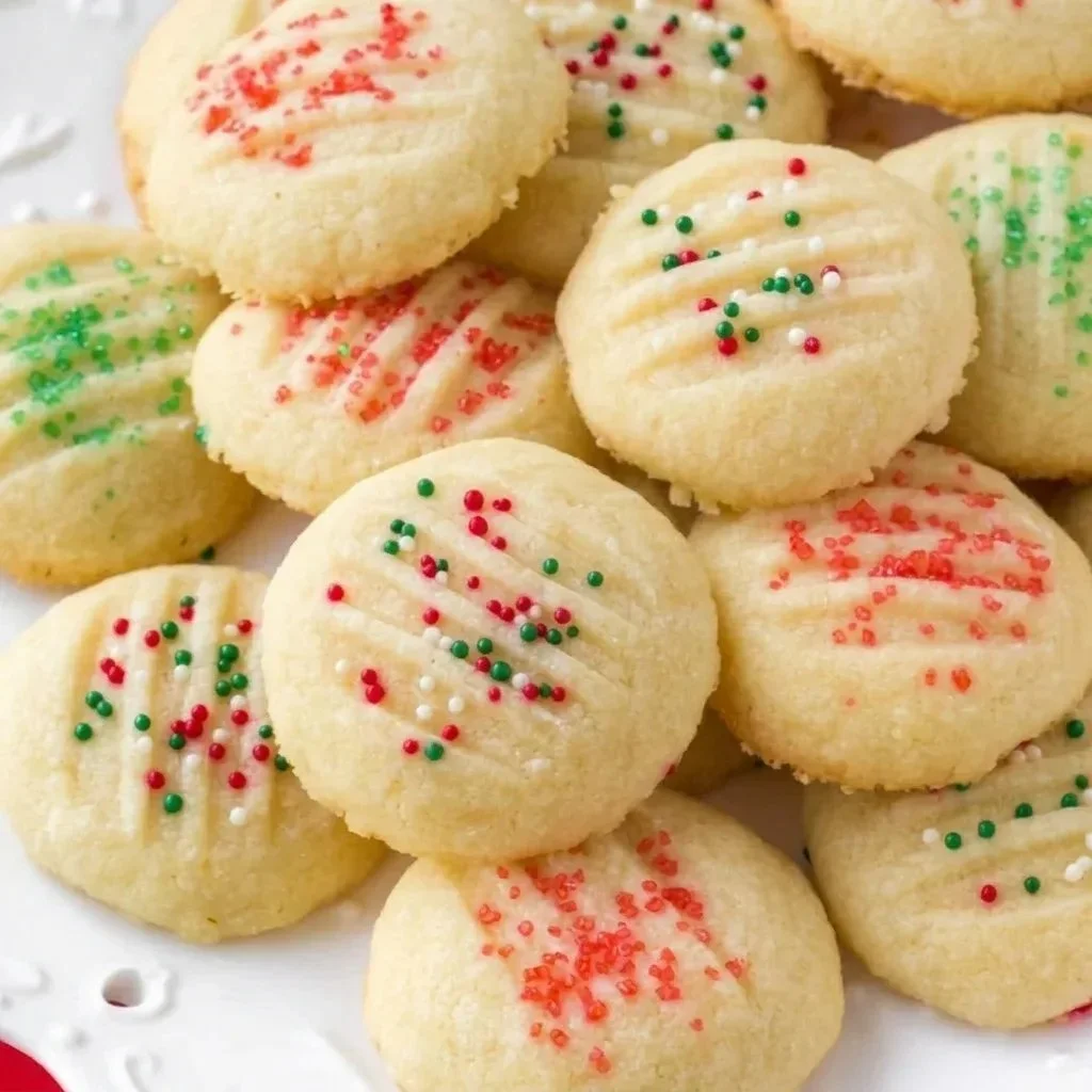 Whipped shortbread cookies on a plate, homemade and delicious dessert.
